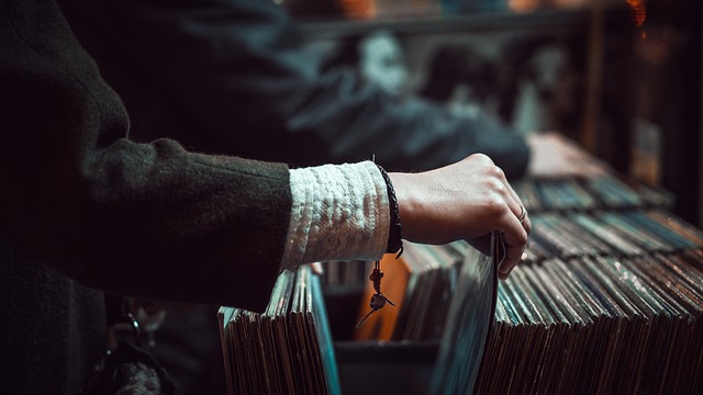 Someone Leafing Through a Collection Of Vinyl Records