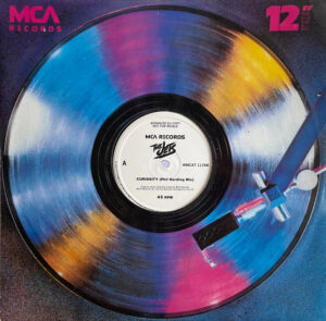 The Jets - Curiosity 12 Inch Vinyl Single (12 Inch Record, Promo)