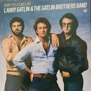 Larry Gatlin and The Gatlin Brothers - Sure Feels Like Love Vinyl LP (LP Record, Album)