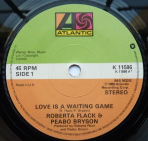 Roberta Flack and Peabo Bryson - Love Is A Waiting Game / Back Together Again 7 Inch Vinyl Single (7 Inch Record)
